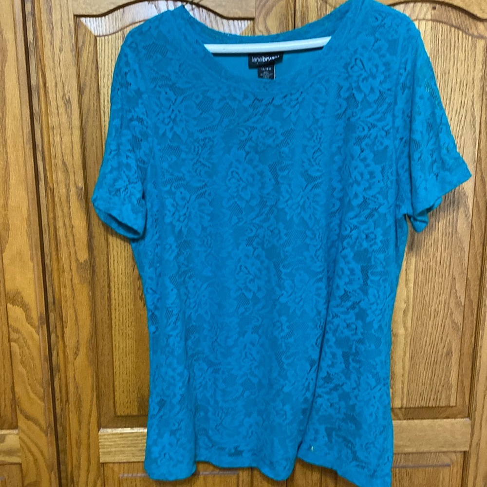 teal short sleeve dressy women’s shirt size 14/16w made with Lacey material